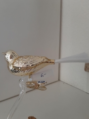 Vogel gold mit Glasschwanz